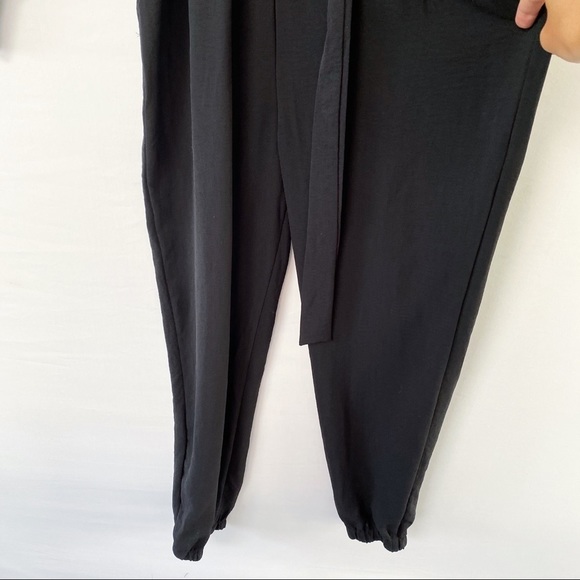 Fraiche By J Utility Long Sleeve Jumpsuit In Black - Picture 6 of 9